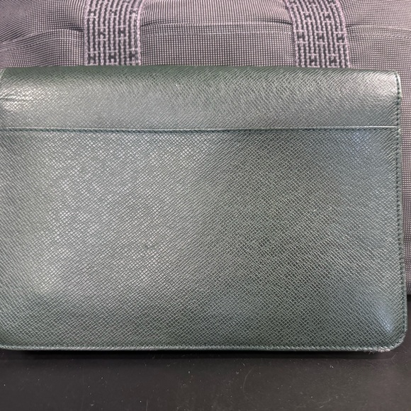 Louis Vuitton Tiaga Leather Clutch - Picture 7 of 12